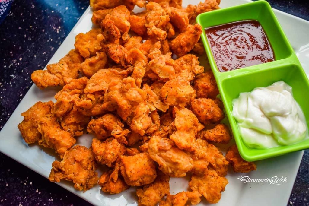 Popcorn chicken with tomato ketchup and plain mayonnaise